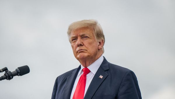 Former President Donald Trump looks on before speaking during a tour to an unfinished section of the border wall on June 30, 2021 in Pharr, Texas. Gov. Abbott has pledged to build a state-funded border wall between Texas and Mexico as a surge of mostly Central American immigrants crossing into the United States has challenged U.S. immigration agencies. So far in 2021, U.S. Border Patrol agents have apprehended more than 900,000 immigrants crossing into the United States on the southern border.  - Sputnik International