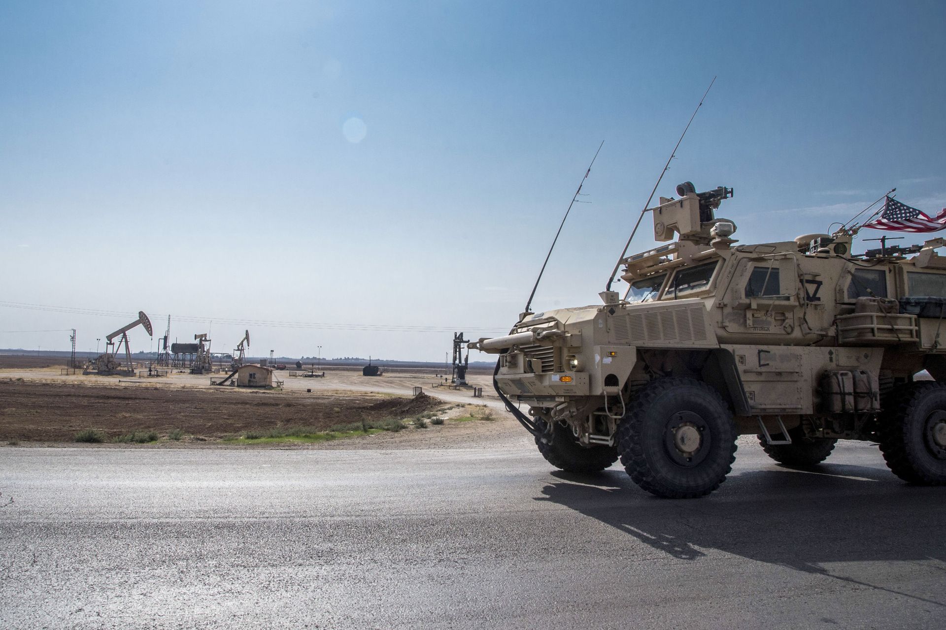 FILE - In this Oct. 28, 2019, file photo, U.S. forces patrol Syrian oil fields. FILE - In this Oct. 28, 2019, file photo, U.S. forces patrol Syrian oil fields. - Sputnik International, 1920, 07.09.2021