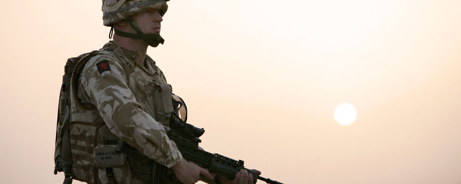 British soldier Captain Roger Walker from Air Operation Officer Battalion headquarters 1st Batalion The Royal Welsh together with US soldiers (not seen) from Bravo Company 1-508 Parachute Infantry Regiment 82nd Airborne Division search for Taliban insurgents in the village of Biabanak, Kandahar province,some 400 km south west of Kabul, 02 July 2007. Biabanak village is situated on the border line of Kandahar and Helmand Province - Sputnik International, 1920, 30.06.2022