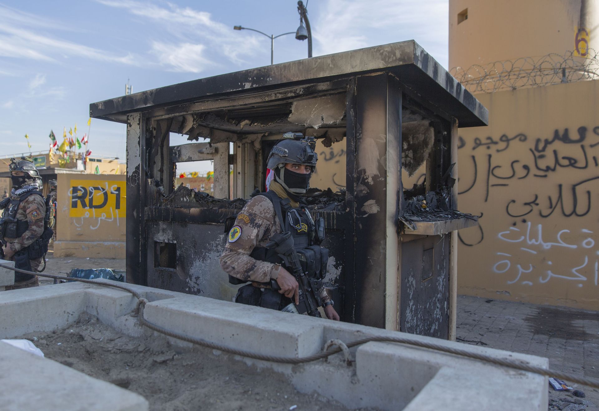 In this Jan. 1, 2020 file photo, Iraqi army soldiers are deployed in front of the U.S. embassy, in Baghdad, Iraq. U.S. and Iraqi officials on Thursday, Dec. 3, say the U.S. is withdrawing some staff from its embassy in Baghdad, temporarily reducing personnel amid regional security concerns. In this Jan. 1, 2020 file photo, Iraqi army soldiers are deployed in front of the U.S. embassy, in Baghdad, Iraq. U.S. and Iraqi officials on Thursday, Dec. 3, say the U.S. is withdrawing some staff from its embassy in Baghdad, temporarily reducing personnel amid regional security concerns. - Sputnik International, 1920, 07.09.2021