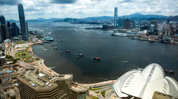 Fishing boats sail through Victoria harbour in Hong Kong on July 1, 2019 - Sputnik International