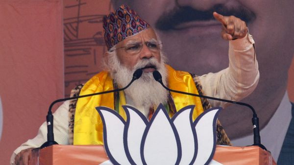 Indian Prime Minister Narendra Modi gestures as he speaks in a rally during the ongoing Phase 4 of West Bengal's assembly election, at Kawakhali on the outskirts of Siliguri on April 10, 2021 - Sputnik International