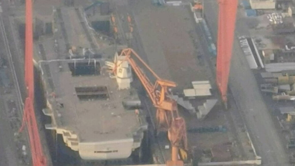 The Type 003 aircraft carrier under construction at Jiangnan Shipyard in Shanghai, China, after installation of its command island. The Type 003 aircraft carrier under construction at Jiangnan Shipyard in Shanghai, China, after installation of its command island. - Sputnik International