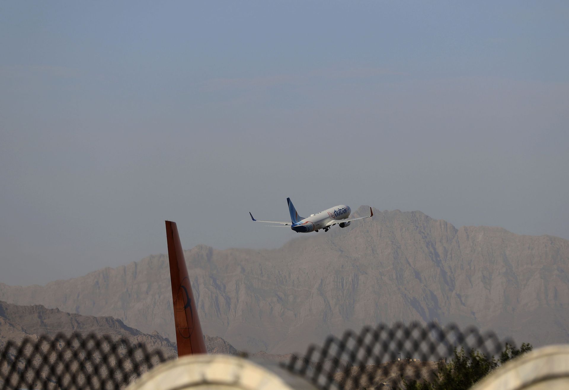 A fly Dubai plane departs Hamid Karzai International Airport in Kabul, Afghanistan, Sunday, July 4, 2021. A fly Dubai plane departs Hamid Karzai International Airport in Kabul, Afghanistan, Sunday, July 4, 2021. - Sputnik International, 1920, 07.09.2021