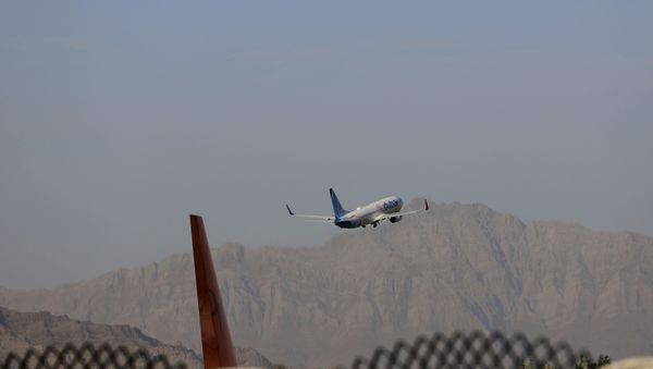 A fly Dubai plane departs Hamid Karzai International Airport in Kabul, Afghanistan, Sunday, July 4, 2021. - Sputnik International