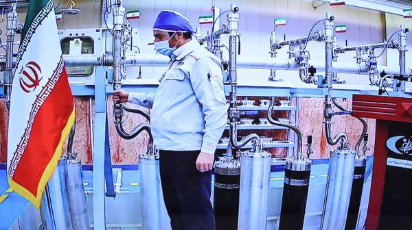 A handout picture provided by the Iranian presidential office on April 10, 2021, shows a grab of a videoconference screen of an enginere inside Iran's Natanz uranium enrichment plant, shown during a ceremony headed by the country's president on Iran's National Nuclear Technology Day, in the capital Tehran - Sputnik International