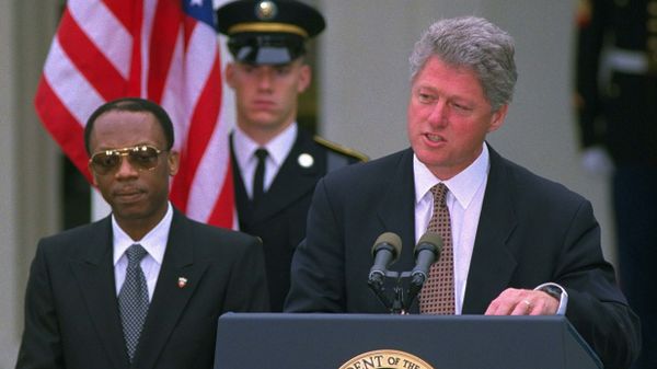 President Clinton, accompanied by Haitian President Jean-Bertrand Aristide, speaks at the White House Friday, October 14, 1994, during a farewell ceremony for the Haitian president. President Clinton, accompanied by Haitian President Jean-Bertrand Aristide, speaks at the White House Friday, October 14, 1994, during a farewell ceremony for the Haitian president. - Sputnik International