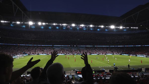Fans react during the Euro 2020 soccer championship semifinal match between England and Denmark at Wembley stadium in London, Wednesday, July 7, 2021. - Sputnik International
