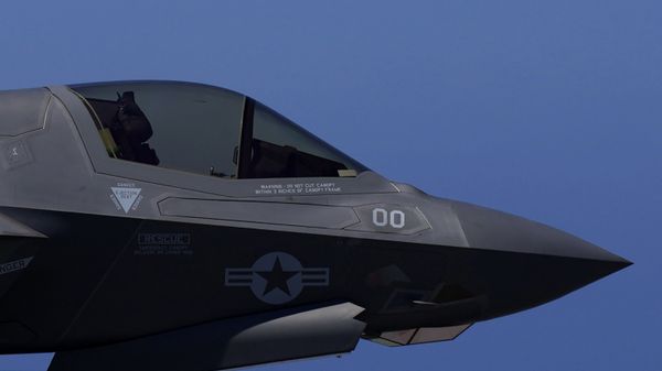 F-35 aircraft fly over the U.K.'s aircraft carrier HMS Queen Elizabeth in the Mediterranean Sea on Sunday, June 20, 2021.  - Sputnik International