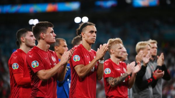 Soccer Football - Euro 2020 - Semi Final - England v Denmark - Wembley Stadium, London, Britain - July 7, 2021 Denmark's Joakim Maehle and Yussuf Poulsen with teammates applaud the fans after the match Soccer Football - Euro 2020 - Semi Final - England v Denmark - Wembley Stadium, London, Britain - July 7, 2021 Denmark's Joakim Maehle and Yussuf Poulsen with teammates applaud the fans after the match - Sputnik International