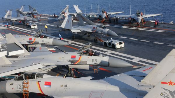 People's Liberation Army Navy J-15 Flying Shark fighters parked about the Chinese aircraft carrier Liaoning People's Liberation Army Navy J-15 Flying Shark fighters parked about the Chinese aircraft carrier Liaoning - Sputnik International