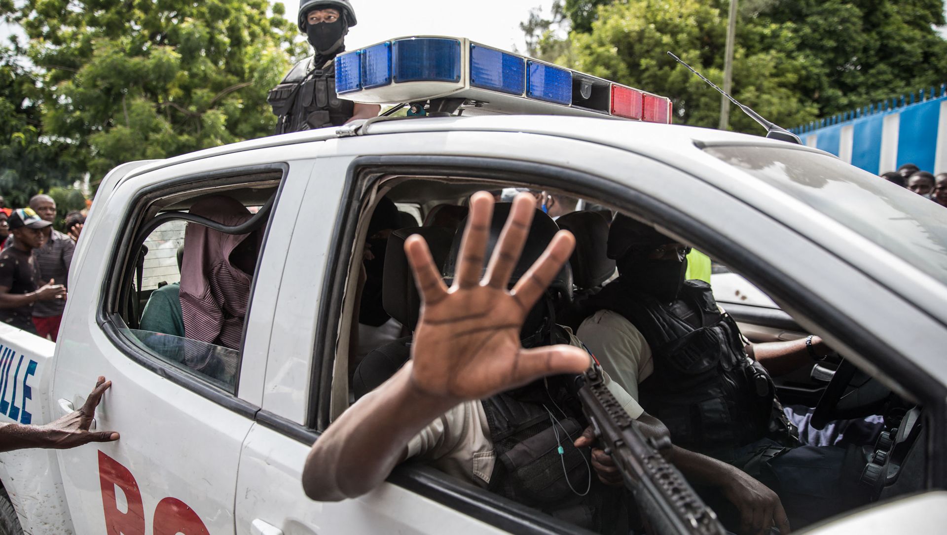 Two men, accused of being involved in the assassination of President Jovenel Moise, are being transported to the Petionville station in a police car in Port au Prince on July 8, 2021 Two men, accused of being involved in the assassination of President Jovenel Moise, are being transported to the Petionville station in a police car in Port au Prince on July 8, 2021 - Sputnik International, 1920, 10.07.2021