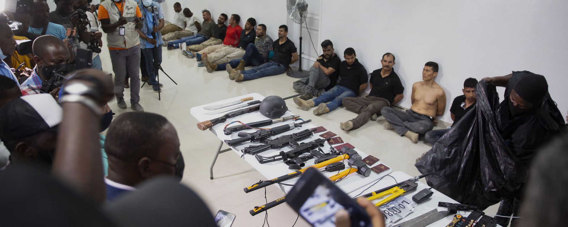 Suspects in the assassination of Haiti's President Jovenel Moise are shown to the media, along with the weapons and equipment they allegedly used in the attack, at the General Direction of the police in Port-au-Prince, Haiti, Thursday, July 8, 2021. Suspects in the assassination of Haiti's President Jovenel Moise are shown to the media, along with the weapons and equipment they allegedly used in the attack, at the General Direction of the police in Port-au-Prince, Haiti, Thursday, July 8, 2021. - Sputnik International, 1920, 10.07.2021