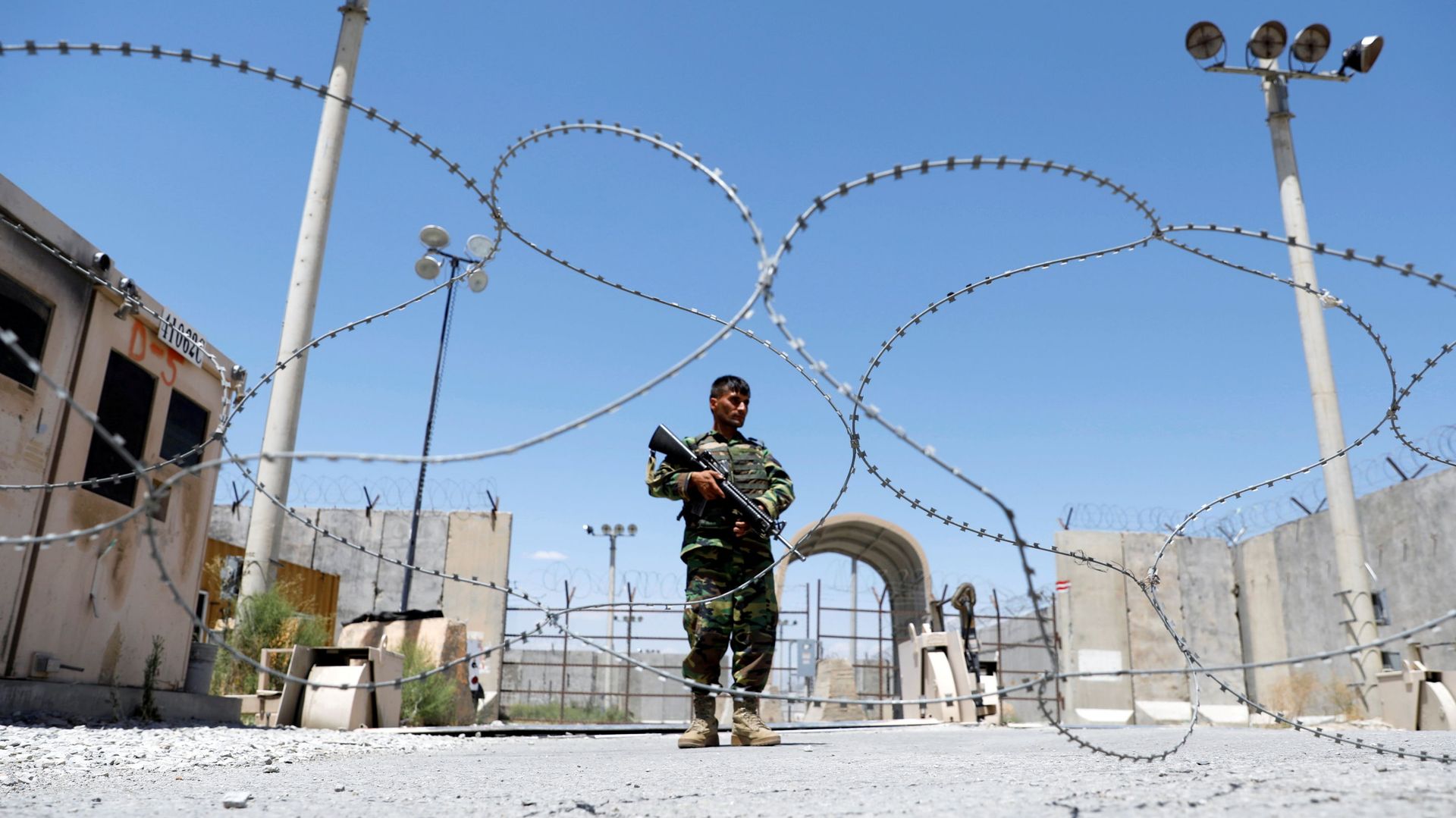 An Afghan National Army soldier stands guard at the gate of Bagram U.S. air base, on the day the last of American troops vacated it, Parwan province, Afghanistan July 2, 2021. An Afghan National Army soldier stands guard at the gate of Bagram U.S. air base, on the day the last of American troops vacated it, Parwan province, Afghanistan July 2, 2021. - Sputnik International, 1920, 09.07.2021