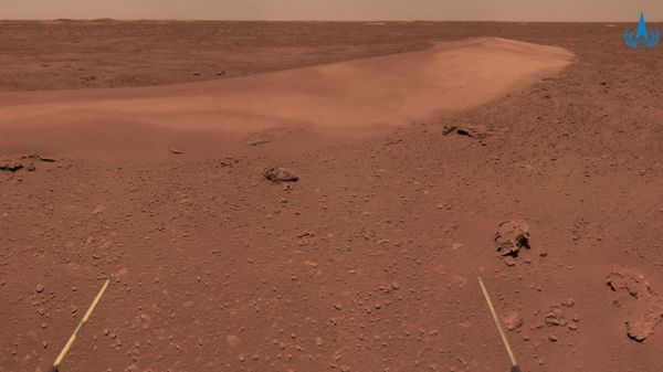 This handout photograph taken on June 26, 2021 and released on July 9, 2021 by the China National Space Administration (CNSA) shows the surface of Mars taken from China's Zhurong Mars rover. - Sputnik International