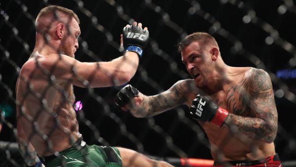 Dustin Poirier in action against Conor McGregor - Sputnik International