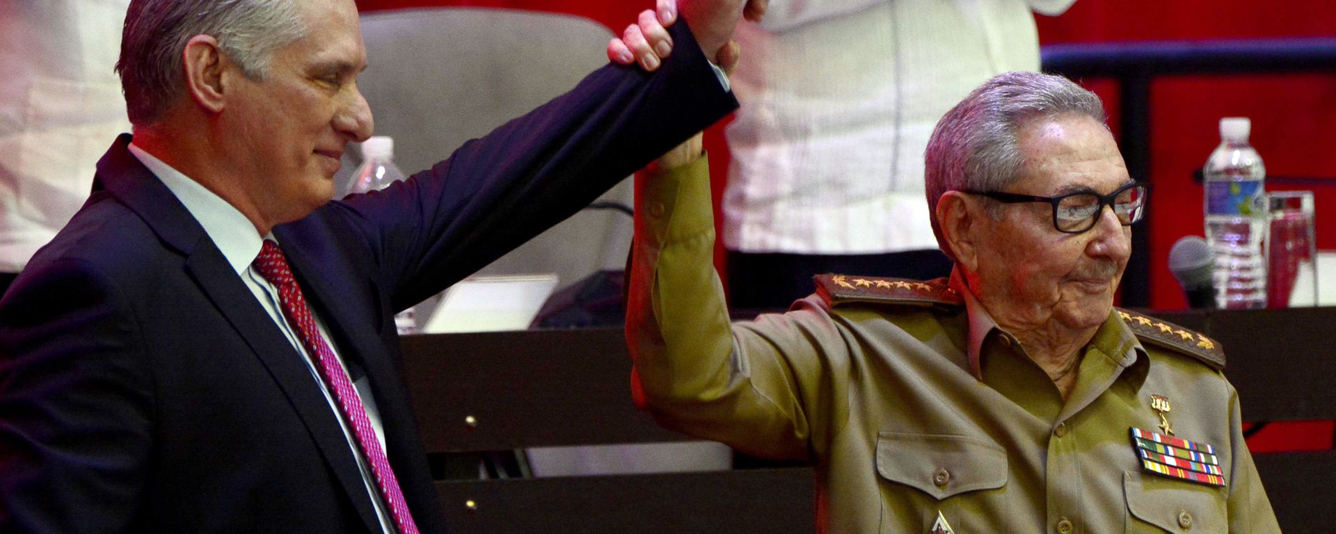 Raul Castro, right, raises the hand of Cuban President Miguel Diaz-Canel after Diaz-Canel was elected First Secretary of the Communist Party at the closing session of Cuban Communist Party's  8th Congress at the Convention Palace in Havana, Cuba, Monday, April 19, 2021. - Sputnik International, 1920, 11.07.2021