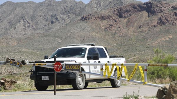 A Texas State Park police officer sits in a patrol truck guarding an entrance to the Franklin Mountains Sunday, April 19, 2020, in El Paso, Texas.  - Sputnik International