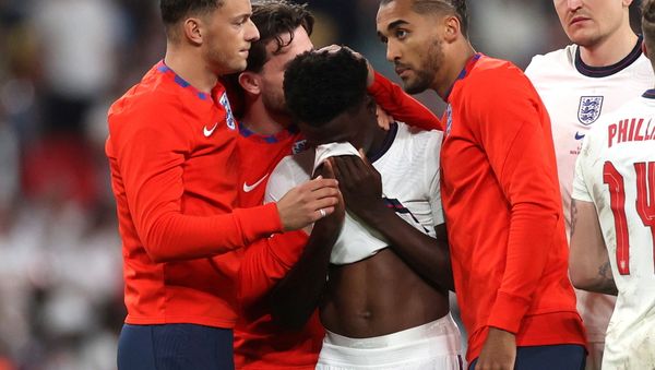 Wembley Stadium, London, Britain - July 11, 2021 England's Bukayo Saka looks dejected after losing the penalty shootout as teammates console him - Sputnik International