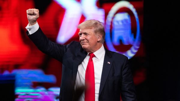 Former US President Donald Trump pumps his fist as he walks off after speaking at the Conservative Political Action Conference (CPAC) in Dallas, Texas on July 11, 2021 - Sputnik International