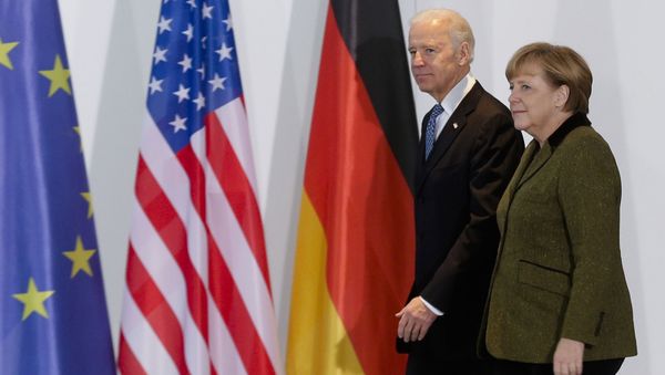 In this Feb. 1, 2013 file photo, German Chancellor Angela Merkel, right, and U.S. Vice President Joe Biden walk at the chancellery in Berlin, Germany. On Biden’s first foreign trip as president, he will find many of his hosts in Europe welcoming but wary after a tense four years between Europe and the U.S. under former President Donald Trump. (AP Photo/Markus Schreiber, File) - Sputnik International