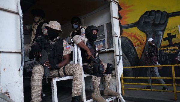Haitian police patrol the streets as protests were planned after the assassination of President Jovenel Moise, in Port-au-Prince, Haiti July 12, 2021 - Sputnik International