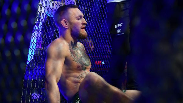 Jul 10, 2021; Las Vegas, Nevada, USA; Conor McGregor reacts following an injury suffered against Dustin Poirier during UFC 264 at T-Mobile Arena. - Sputnik International