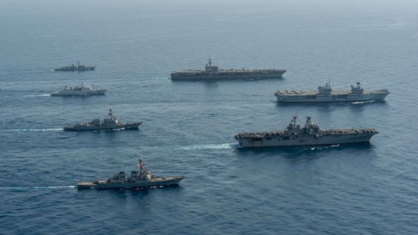 Ships of the UK Carrier Strike Group, USS Ronald Reagan Carrier Strike Group, and Iwo Jima Amphibious Ready Group operate in formation in the Gulf of Aden, July 12. - Sputnik International