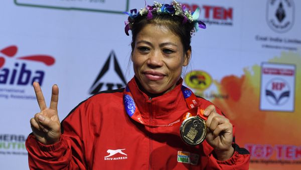 Mary Kom of India gestures with her gold medal after winning the 45-48 kg category final fight at the 2018 AIBA Women's World Boxing Championships in New Delhi on November 24, 2018 Mary Kom of India gestures with her gold medal after winning the 45-48 kg category final fight at the 2018 AIBA Women's World Boxing Championships in New Delhi on November 24, 2018 - Sputnik International