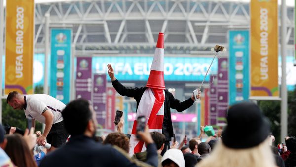 Soccer Football - Euro 2020 - Final - Fans gather for Italy v England - Wembley Stadium, London, Britain - July 11, 2021 Picture taken July 11, 2021 England fans outside Wembley Stadium before the match - Sputnik International