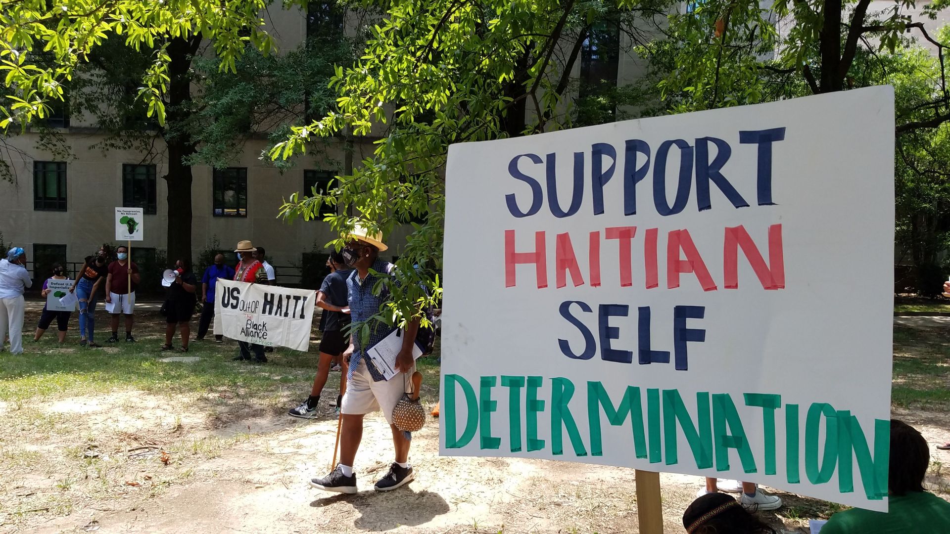 Activists rally outside the US State Department against US involvement in Haiti, including the potential deployment of US troops after the assassination of Haitian President Jovenel Moise Activists rally outside the US State Department against US involvement in Haiti, including the potential deployment of US troops after the assassination of Haitian President Jovenel Moise - Sputnik International, 1920, 15.07.2021