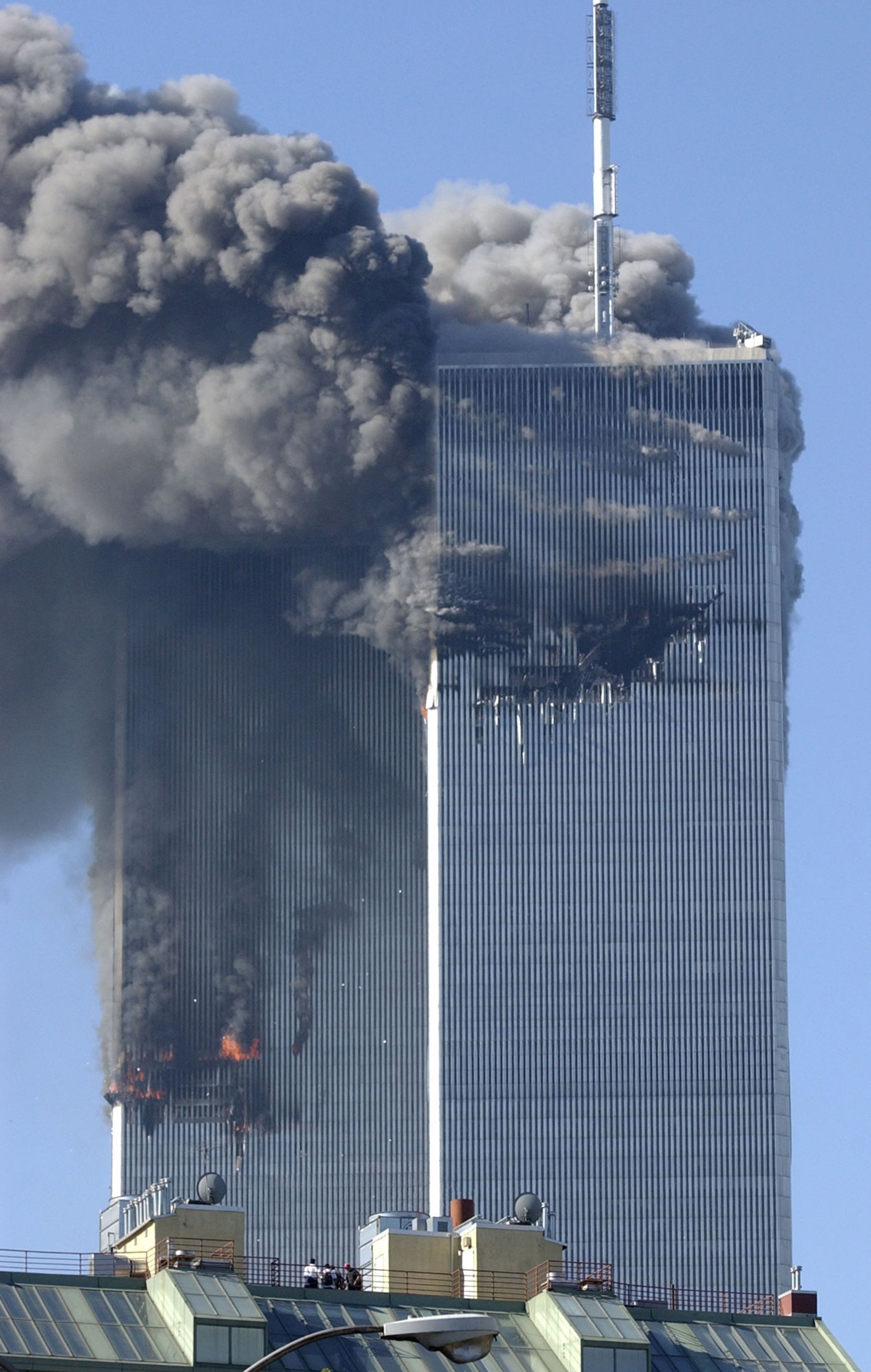 Smoke billows from the North and South Towers of the World Trade Center before they collapsed on September 11, 2001 in New York, NY - Sputnik International, 1920, 13.08.2022