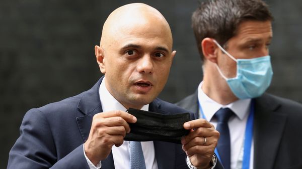 Britain's new Health Secretary Sajid Javid holds a face mask, as he leaves Downing Street in London, Britain, June 30, 2021 - Sputnik International