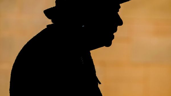 Britain's Queen Elizabeth is seen in silhouette as she visits Manchester Cathedral, in Manchester, Britain, July 8, 2021 - Sputnik International