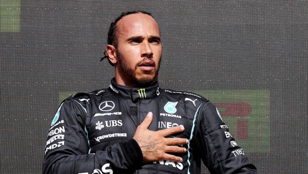 Formula One F1 - British Grand Prix - Silverstone Circuit, Silverstone, Britain - July 18, 2021 Mercedes' Lewis Hamilton celebrates on the podium after winning the race - Sputnik International