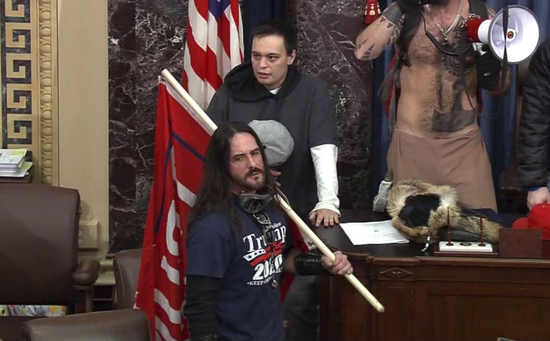 FILE - In this file image from U.S. Capitol Police video, Paul Allard Hodgkins, 38, of Tampa, Fla., front, stands in the well on the floor of the U.S. Senate on Jan. 6, 2021, at the Capitol in Washington. - Sputnik International, 1920, 07.09.2021