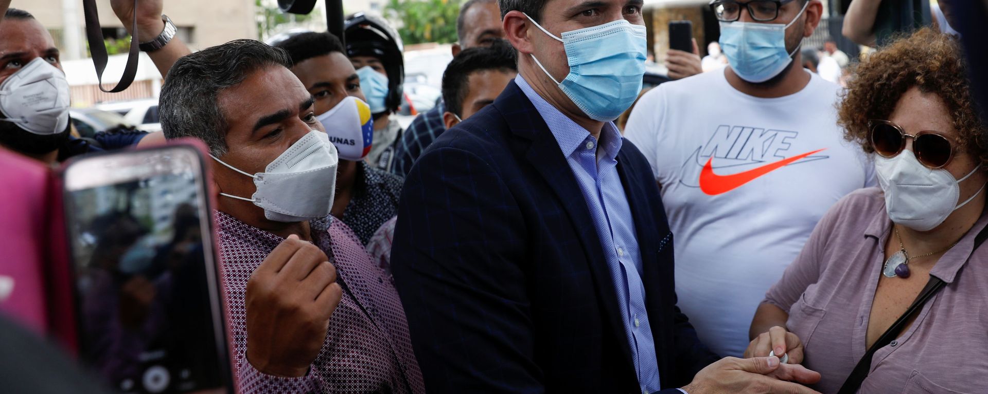Venezuela's opposition figure Juan Guaido greets people, in Caracas, Venezuela on 12 July 2021.   - Sputnik International, 1920, 20.07.2021