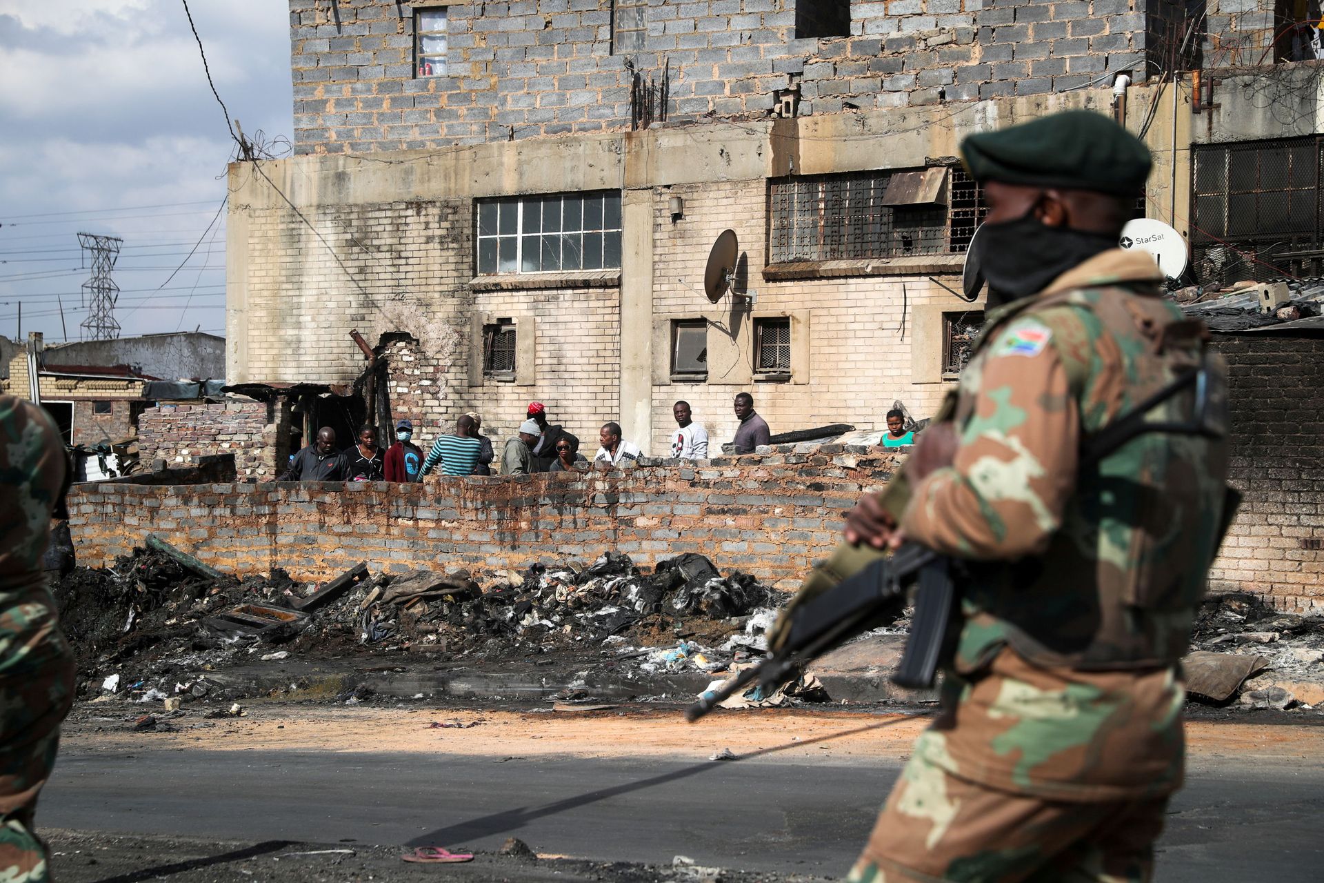 FILE PHOTO: Members of the military patrol through the streets of Alexandra township as the country deploys the army to quell unrest linked to the jailing of former President Jacob Zuma, in Johannesburg - Sputnik International, 1920, 15.09.2021