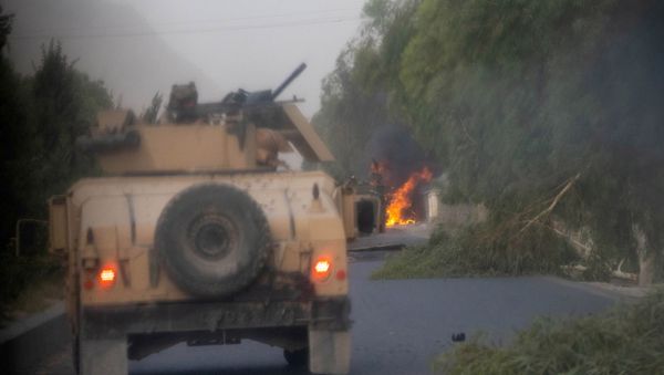 Humvees that belong to Afghan Special Forces are seen destroyed during heavy clashes with Taliban during the rescue mission of a police officer besieged at a check post, in Kandahar province, Afghanistan, July 13, 2021. - Sputnik International