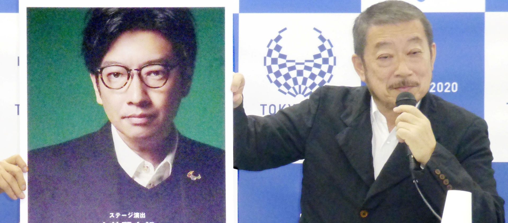 Hiroshi Sasaki, Tokyo 2020 Paralympic Games executive creative director, displays a portrait of Olympics opening ceremony show director Kentaro Kobayashi during a news conference in Tokyo, Japan, in this photo taken by Kyodo December 2019 - Sputnik International, 1920, 22.07.2021