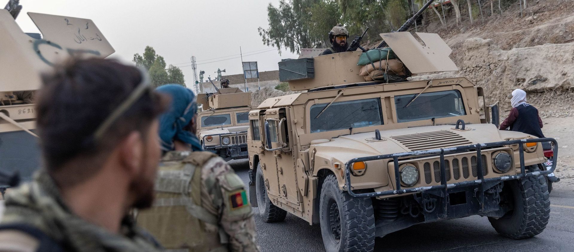 A convoy of Afghan Special Forces is seen during the rescue mission of a police officer besieged at a check post surrounded by Taliban, in Kandahar province, Afghanistan, 13 July 2021. REUTERS/Danish Siddiqui - Sputnik International, 1920, 22.07.2021