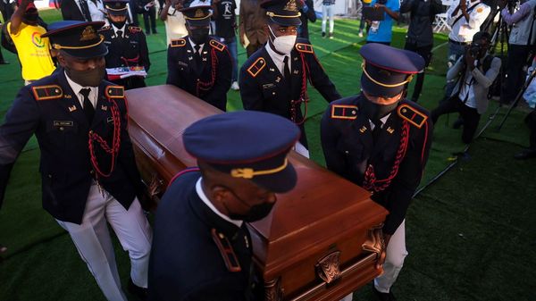 Pallbearers in military attire carry the coffin holding the body of late Haitian President Jovenel Moise after he was shot dead at his home in Port-au-Prince earlier this month, in Cap-Haitien, July 23, 2021. REUTERS/Ricardo Arduengo - Sputnik International