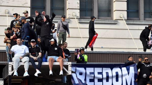 Protesters climb an awning outside Sydney Town Hall during an anti-lockdown rally, as an outbreak of the coronavirus disease (COVID-19) affects Sydney, Australia, 24 July 2021. AAP Image/Mick Tsikas via REUTERS. - Sputnik International