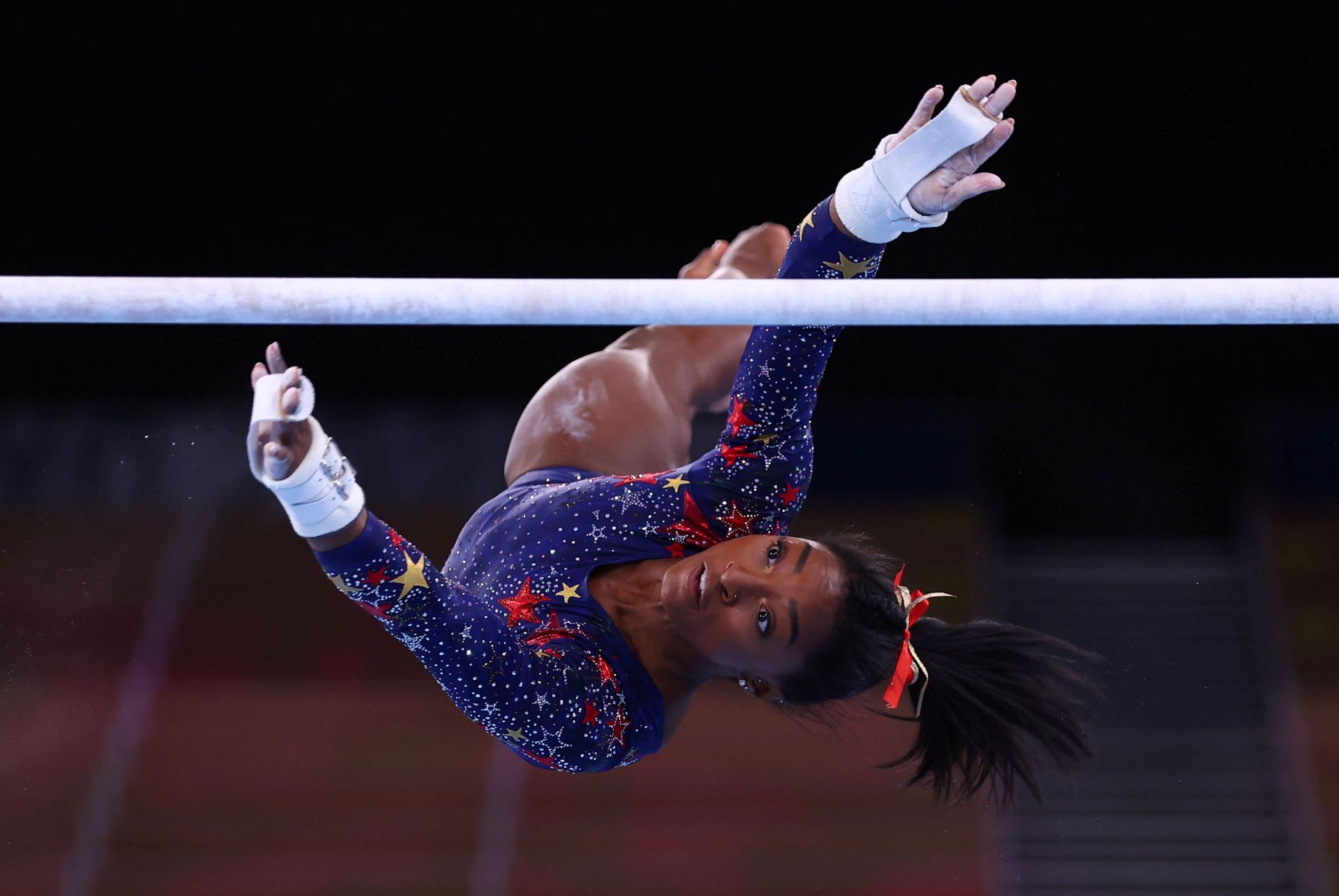 Tokyo 2020 Olympics - Gymnastics - Artistic - Women's Uneven Bars - Qualification - Ariake Gymnastics Centre, Tokyo, Japan - July 25, 2021. Simone Biles of the United States in action during the uneven bars REUTERS/Mike Blake/File photo SEARCH OLYMPICS DAY 3 FOR TOKYO 2020 OLYMPICS EDITOR'S CHOICE, SEARCH REUTERS OLYMPICS TOPIX FOR ALL EDITOR'S CHOICE PICTURES. Tokyo 2020 Olympics - Gymnastics - Artistic - Women's Uneven Bars - Qualification - Ariake Gymnastics Centre, Tokyo, Japan - July 25, 2021. Simone Biles of the United States in action during the uneven bars REUTERS/Mike Blake/File photo SEARCH OLYMPICS DAY 3 FOR TOKYO 2020 OLYMPICS EDITOR'S CHOICE, SEARCH REUTERS OLYMPICS TOPIX FOR ALL EDITOR'S CHOICE PICTURES. - Sputnik International, 1920, 07.09.2021