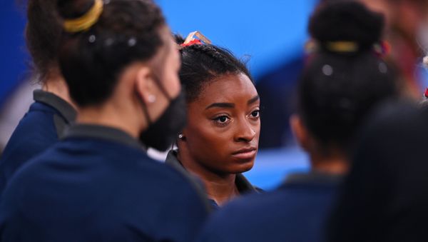Tokyo 2020 Olympics - Gymnastics - Artistic - Women's Individual All-Around - Qualification - Ariake Gymnastics Centre, Tokyo, Japan - July 25, 2021. Simone Biles of the United States looks on during competition. - Sputnik International