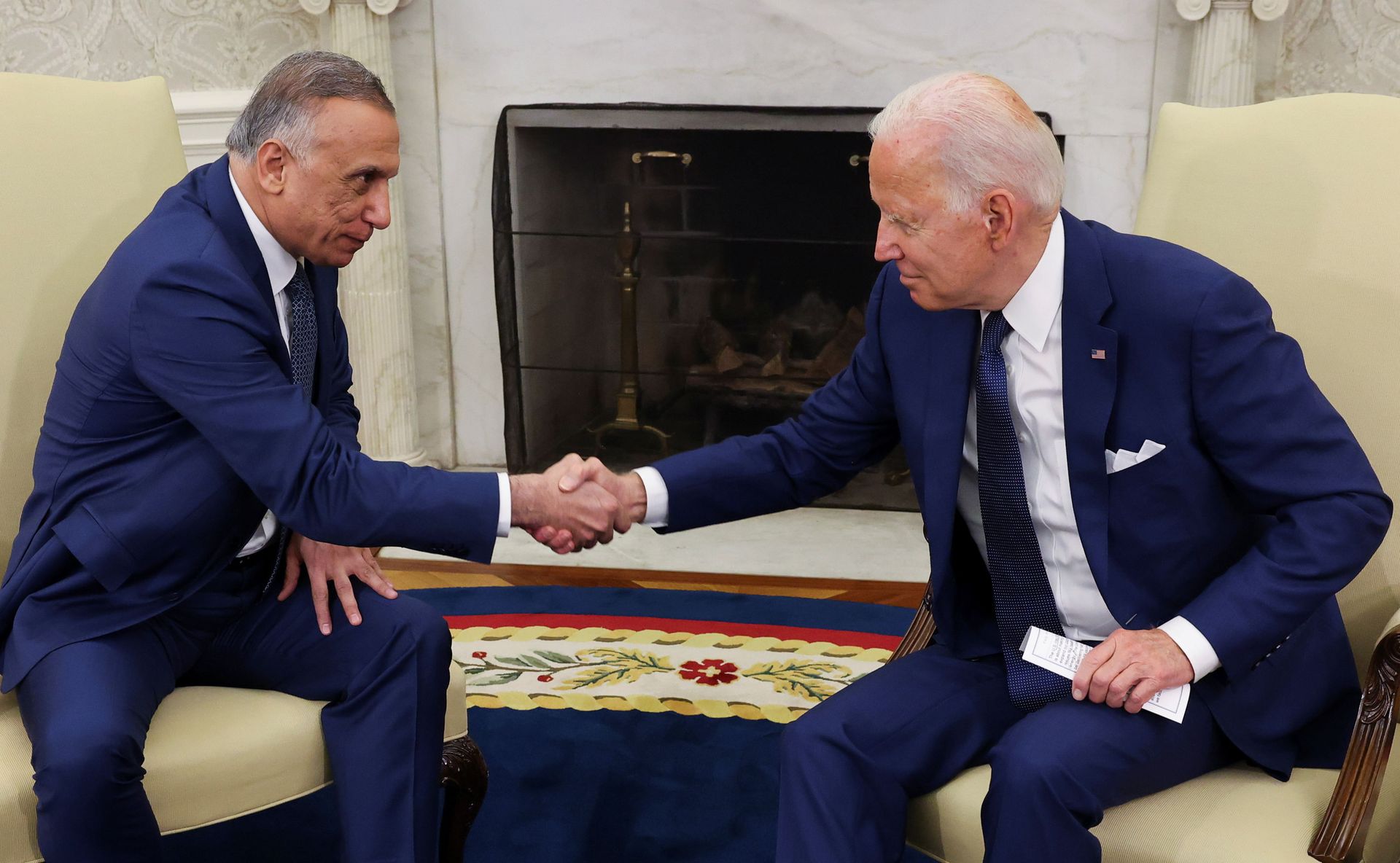 US President Joe Biden greets Iraq's Prime Minister Mustafa Al-Kadhimi during a bilateral meeting in the Oval Office at the White House in Washington, U.S., July 26, 2021 - Sputnik International, 1920, 07.09.2021