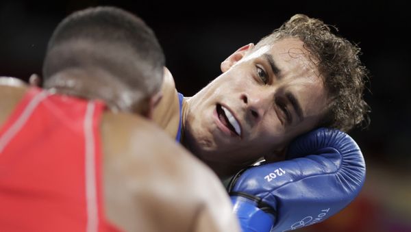 Youness Baalla of Morocco in action against David Nyika of New Zealand - Sputnik International