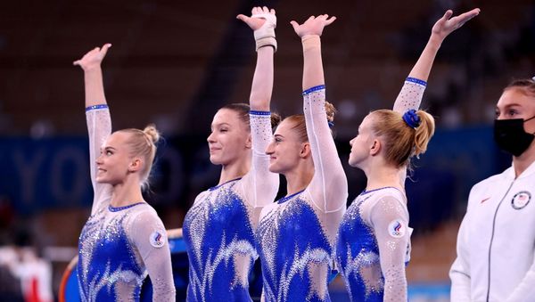 Tokyo 2020 Olympics - Gymnastics - Artistic - Women's Team - Final - Ariake Gymnastics Centre, Tokyo, Japan - July 27, 2021.  Russia team members wave after arrival. - Sputnik International