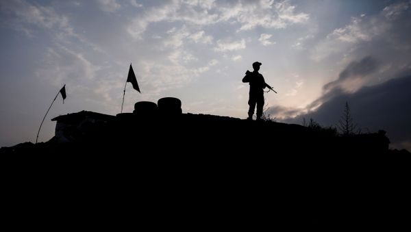 An Afghan police officer keeps watch at the check post on the outskirts of Kabul, Afghanistan July 13, 2021. An Afghan police officer keeps watch at the check post on the outskirts of Kabul, Afghanistan July 13, 2021. - Sputnik International