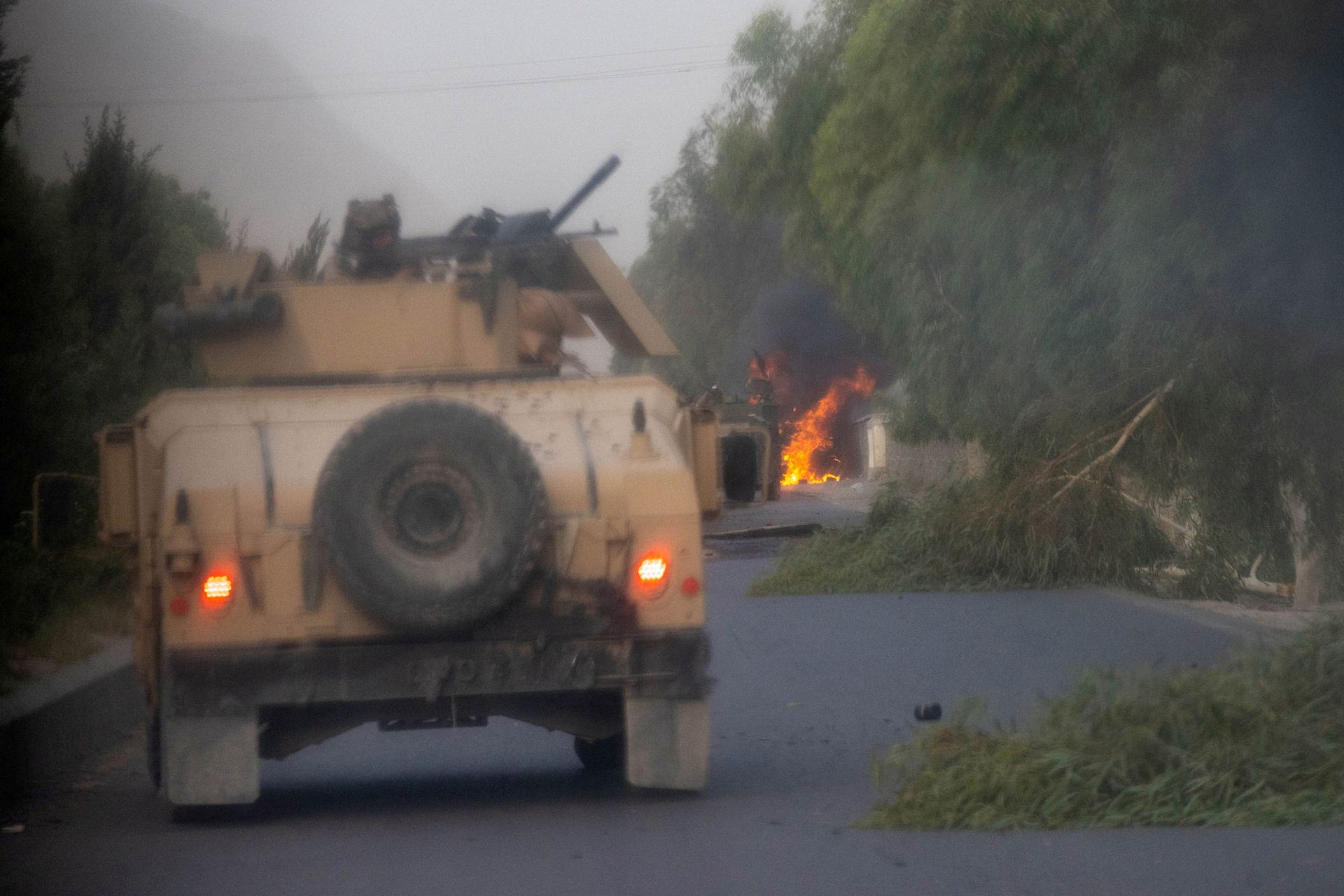 Humvees that belong to Afghan Special Forces are seen destroyed during heavy clashes with Taliban during the rescue mission of a police officer besieged at a check post, in Kandahar province, Afghanistan, July 13, 2021. Humvees that belong to Afghan Special Forces are seen destroyed during heavy clashes with Taliban during the rescue mission of a police officer besieged at a check post, in Kandahar province, Afghanistan, July 13, 2021. - Sputnik International, 1920, 07.09.2021